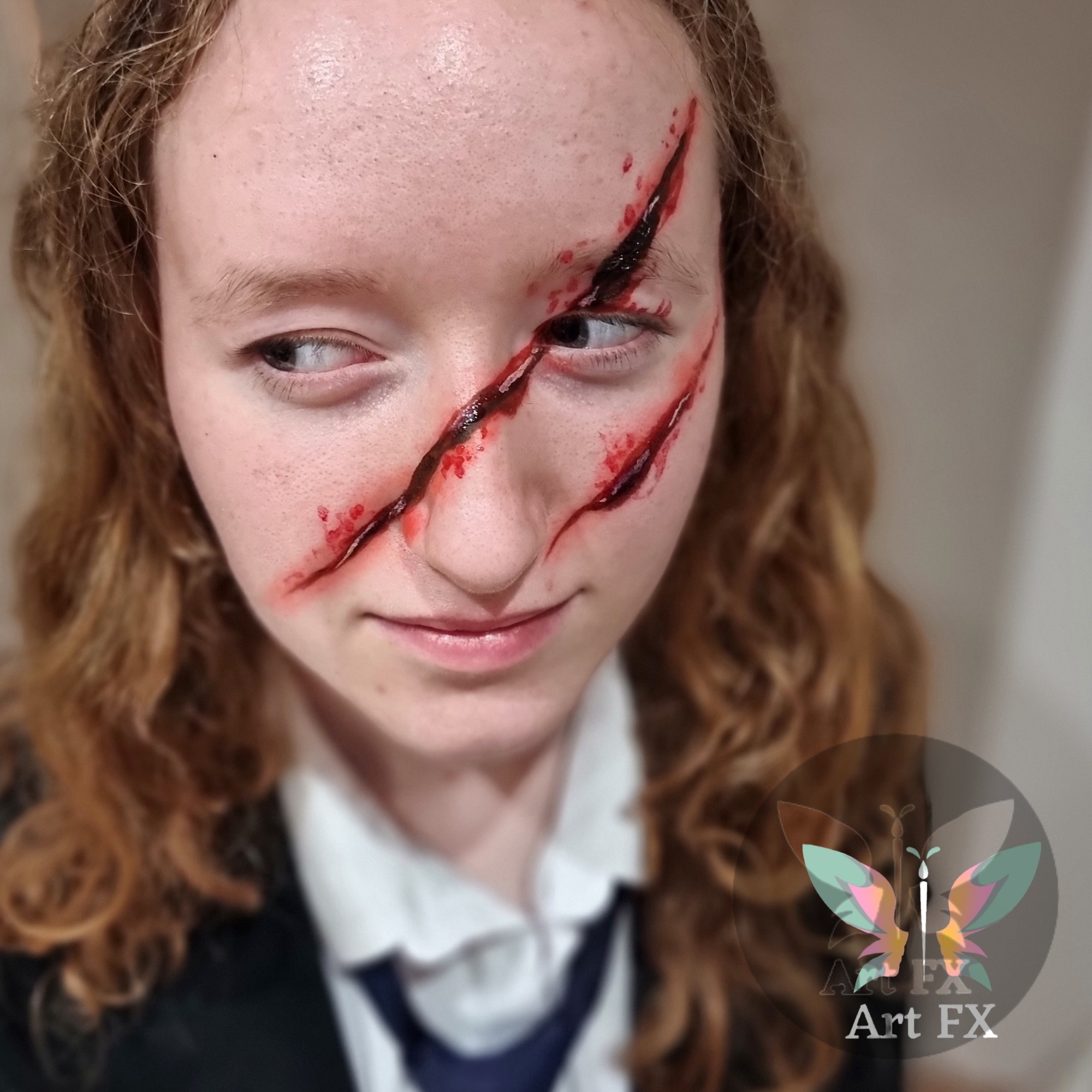Men's creepy black and white skull Halloween makeup